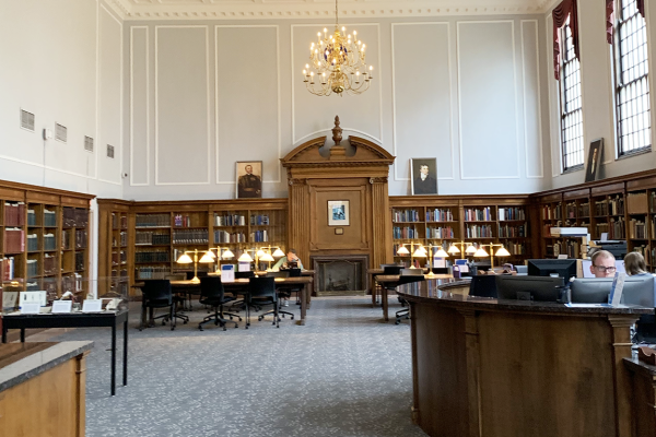 View of the Breckinridge Research Room, showing reference desk, bookshelves, and tables.