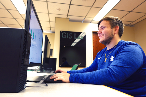 A student uses a computer terminal in the GIS Lab at the Science & Engineering Library.