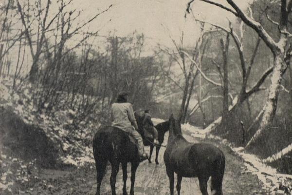 Frontier Nursing Service nurses on horseback on a rural road