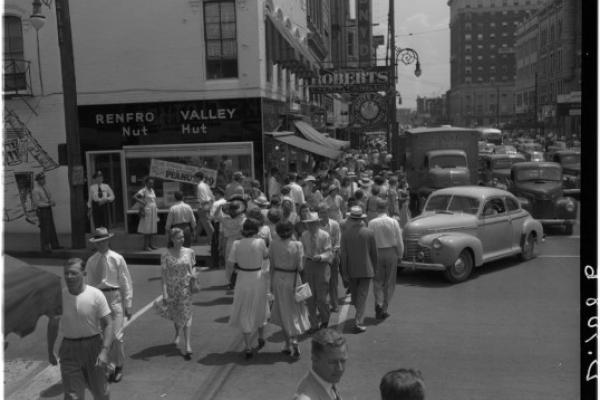 Archival image of crowd on Main Street, Lexington