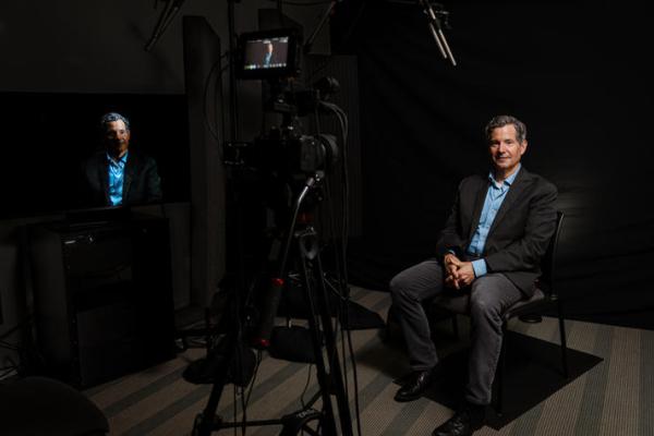 Nunn Center Director Doug Boyd in front of a camera in the Nunn Center recording studio