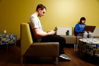 Two students study in the open area of the Medical Center Library. 