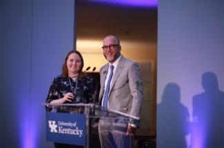 Dean's Award Recipient poses for photo with Dean of Libraries at the Spring Celebration event.