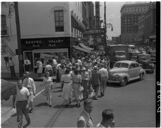 Archival image of crowd on Main Street, Lexington