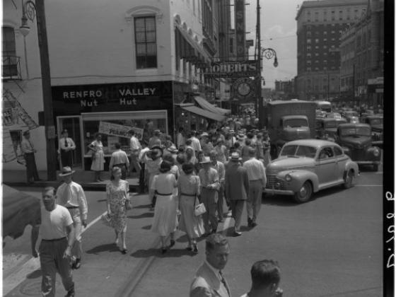 Archival image of crowd on Main Street, Lexington