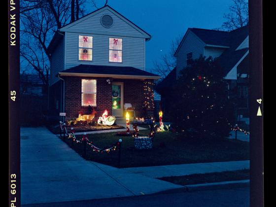 House in the early evening with holiday lights