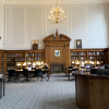View of the Breckinridge Research Room, showing reference desk, bookshelves, and tables.