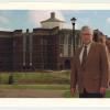 Paul Willis standing in front of the newly completed William T. Young Library.